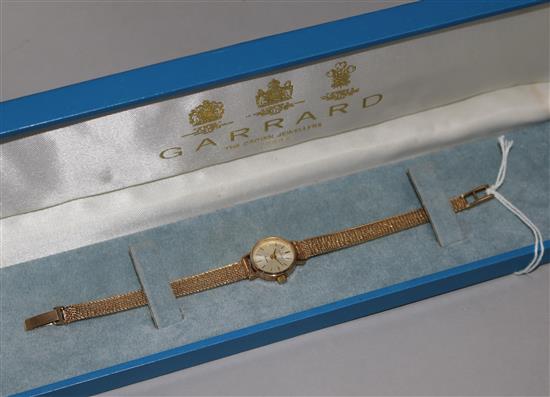A ladys 9ct gold Garrard wrist watch